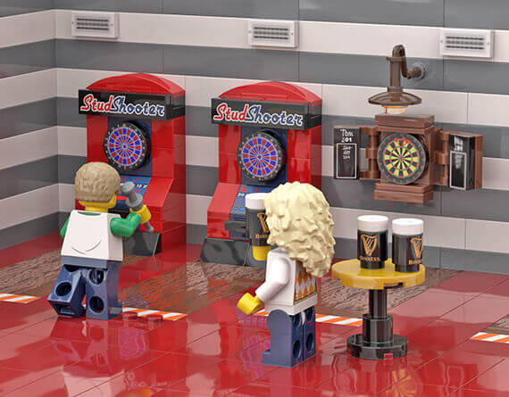 LEGO MOC of a bar with two minifigs paying games and darts while drinking